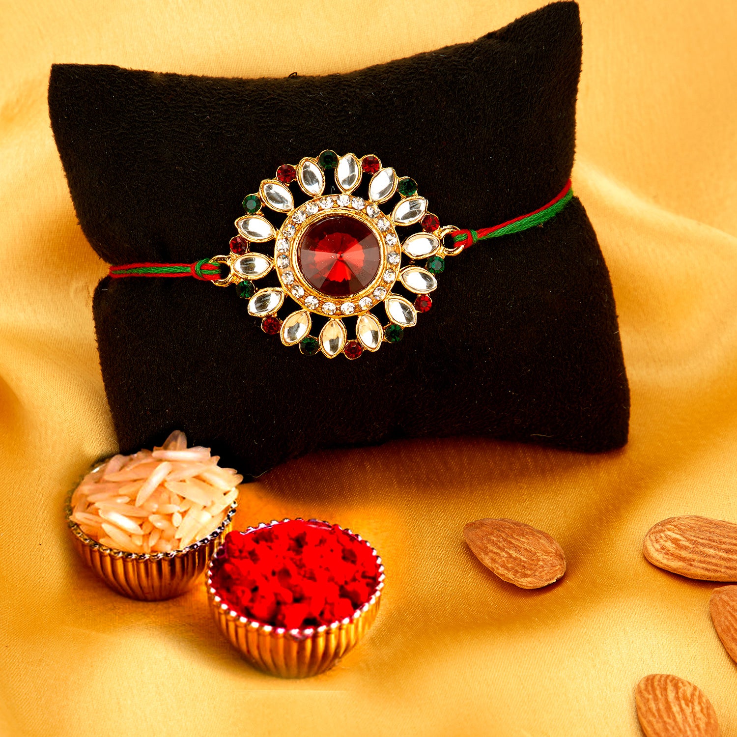 Sukkhi Marvelous Gold Plated Bhaiya Bhabhi Rakhi Lumba Set with Roli Chawal and Raksha Bandhan Greeting Card