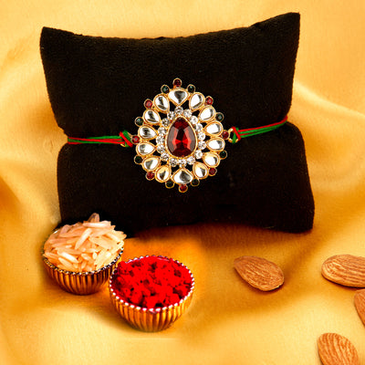 Sukkhi Traditional Gold Plated Bhaiya Bhabhi Rakhi Lumba Set with Roli Chawal and Raksha Bandhan Greeting Card