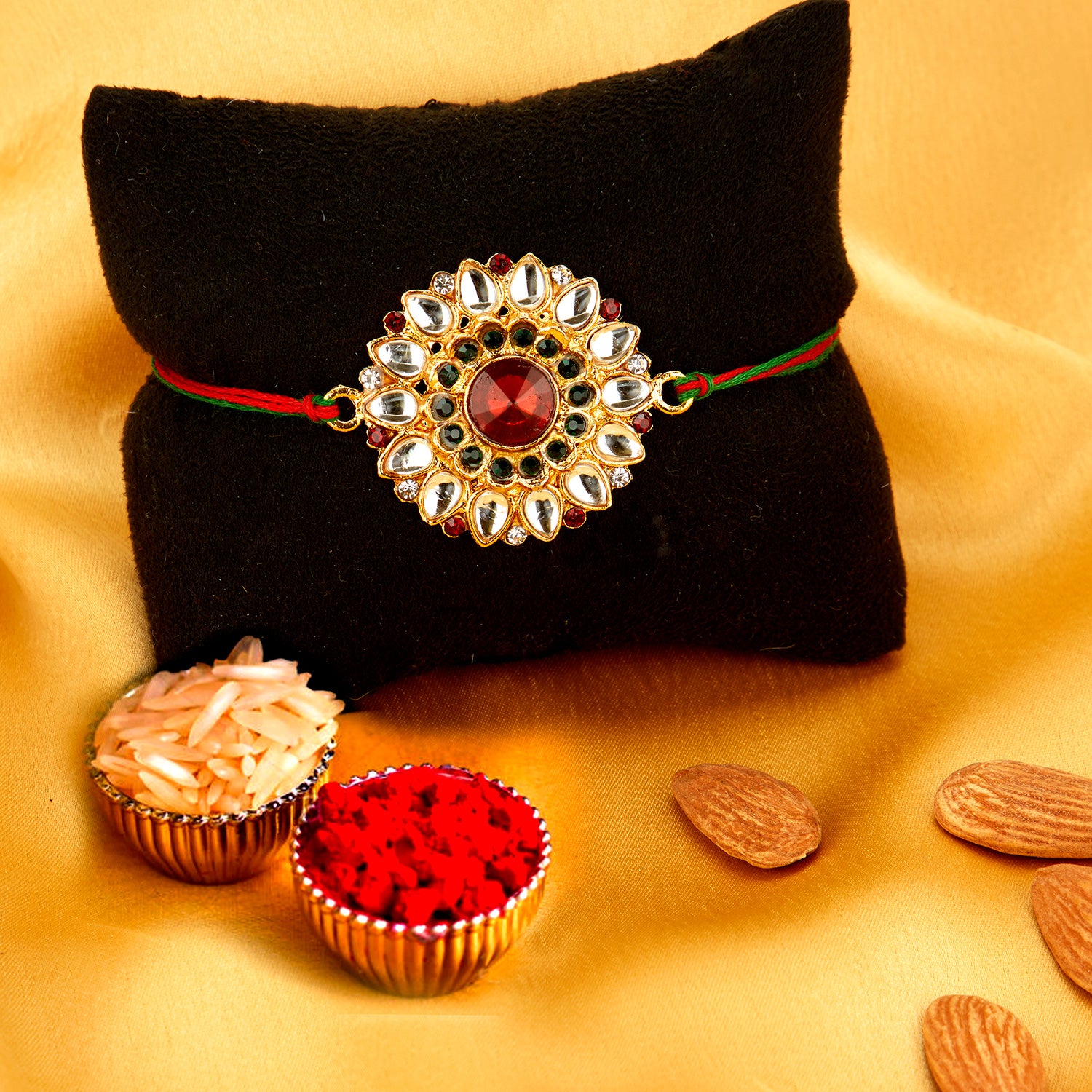Sukkhi Classic Gold Plated Bhaiya Bhabhi Rakhi Lumba Set with Roli Chawal and Raksha Bandhan Greeting Card