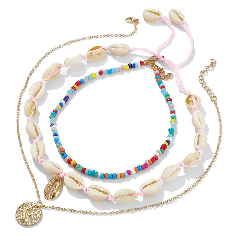 Scintillare by Sukkhi Exclusive Gold Plated Sea Shell Multi Layered Necklace for Women