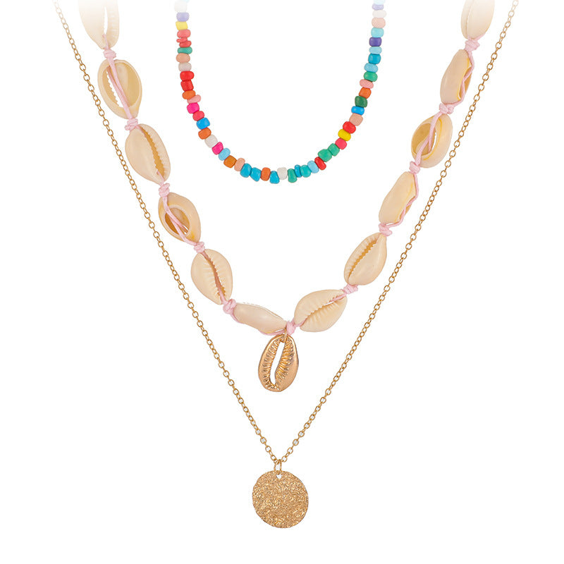 Scintillare by Sukkhi Exclusive Gold Plated Sea Shell Multi Layered Necklace for Women