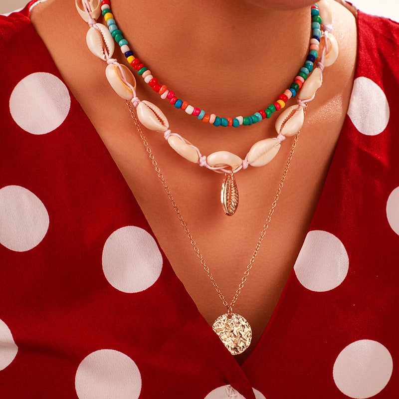 Scintillare by Sukkhi Exclusive Gold Plated Sea Shell Multi Layered Necklace for Women