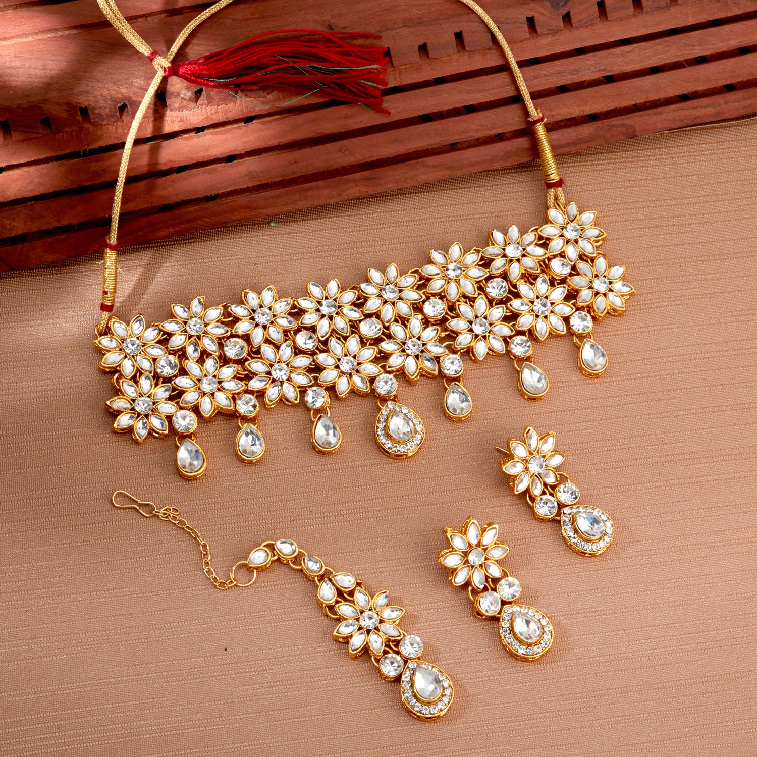 Sukkhi Mesmerizing Gold Plated Floral Choker Necklace Set for Women