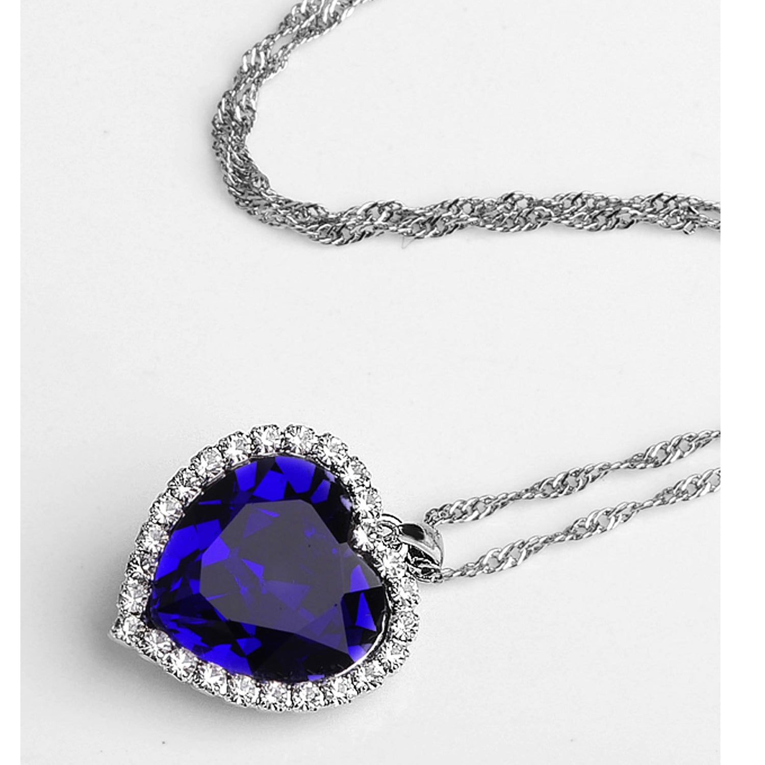 Sukkhi Modern Blue Titanic Valentine Heart Crystal Rhodium Plated Pendant for Women