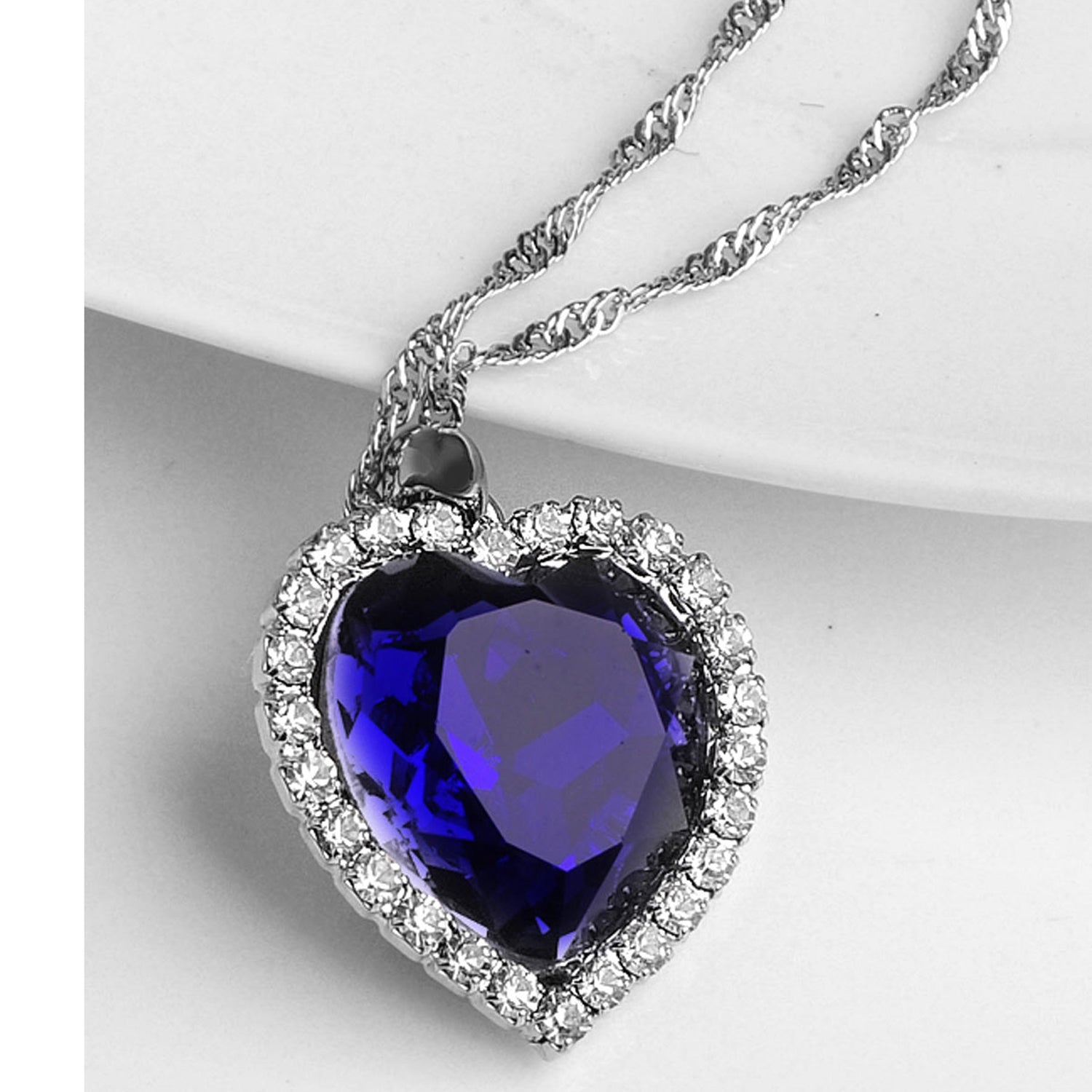 Sukkhi Modern Blue Titanic Valentine Heart Crystal Rhodium Plated Pendant for Women
