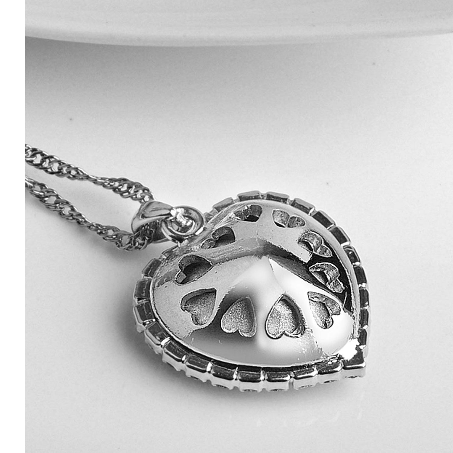 Sukkhi Modern Blue Titanic Valentine Heart Crystal Rhodium Plated Pendant for Women