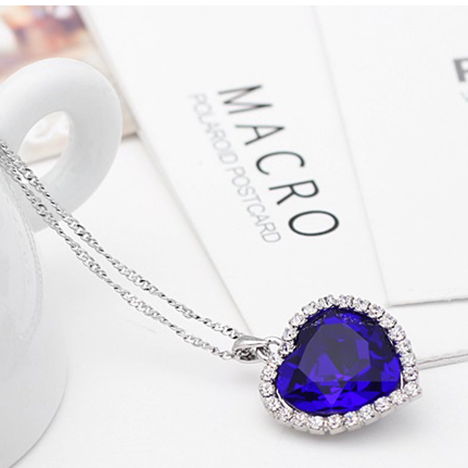 Sukkhi Modern Blue Titanic Valentine Heart Crystal Rhodium Plated Pendant for Women