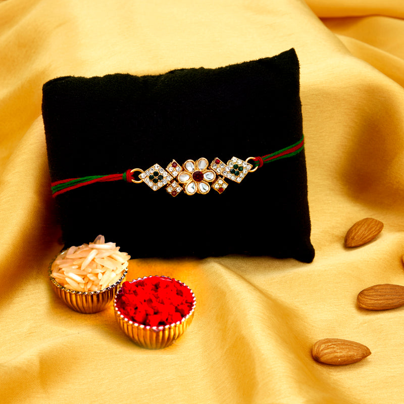 Sukkhi Awesome Gold Plated Floral Rakhi with Roli Chawal and Raksha Ba ...