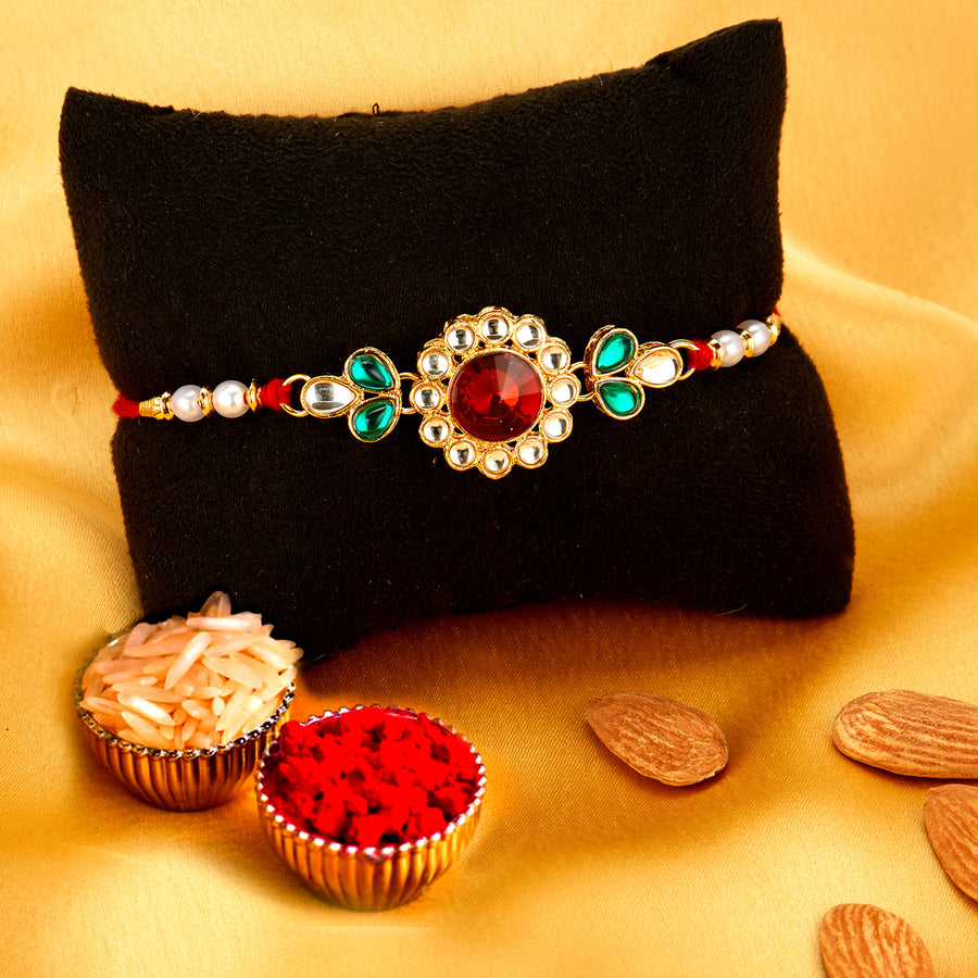 Sukkhi Lovely Gold Plated Rakhi with Roli Chawal and Raksha Bandhan Greeting Card for Men