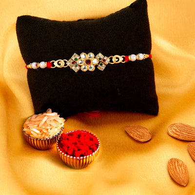 Sukkhi Gleaming Gold Plated Floral Rakhi with Roli Chawal and Raksha Bandhan Greeting Card for Men