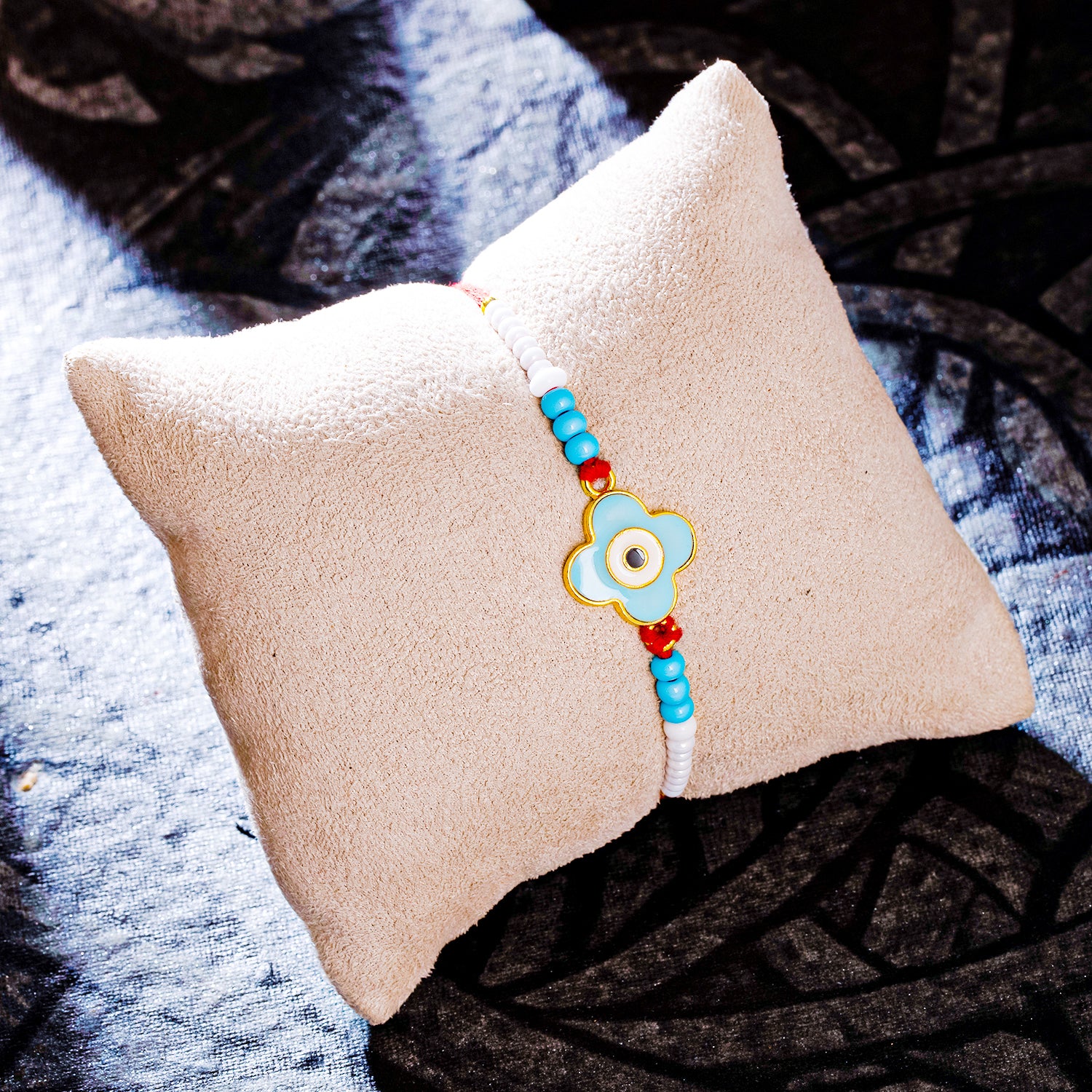 Sukkhi Brilliant Gold Plated Evil Eye Rakhi with Roli Chawal and Raksha Bandhan Greeting Card For Men