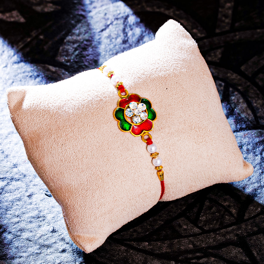 Sukkhi Delightful Gold Plated Floral Meenakari Rakhi with Roli Chawal and Raksha Bandhan Greeting Card For Men