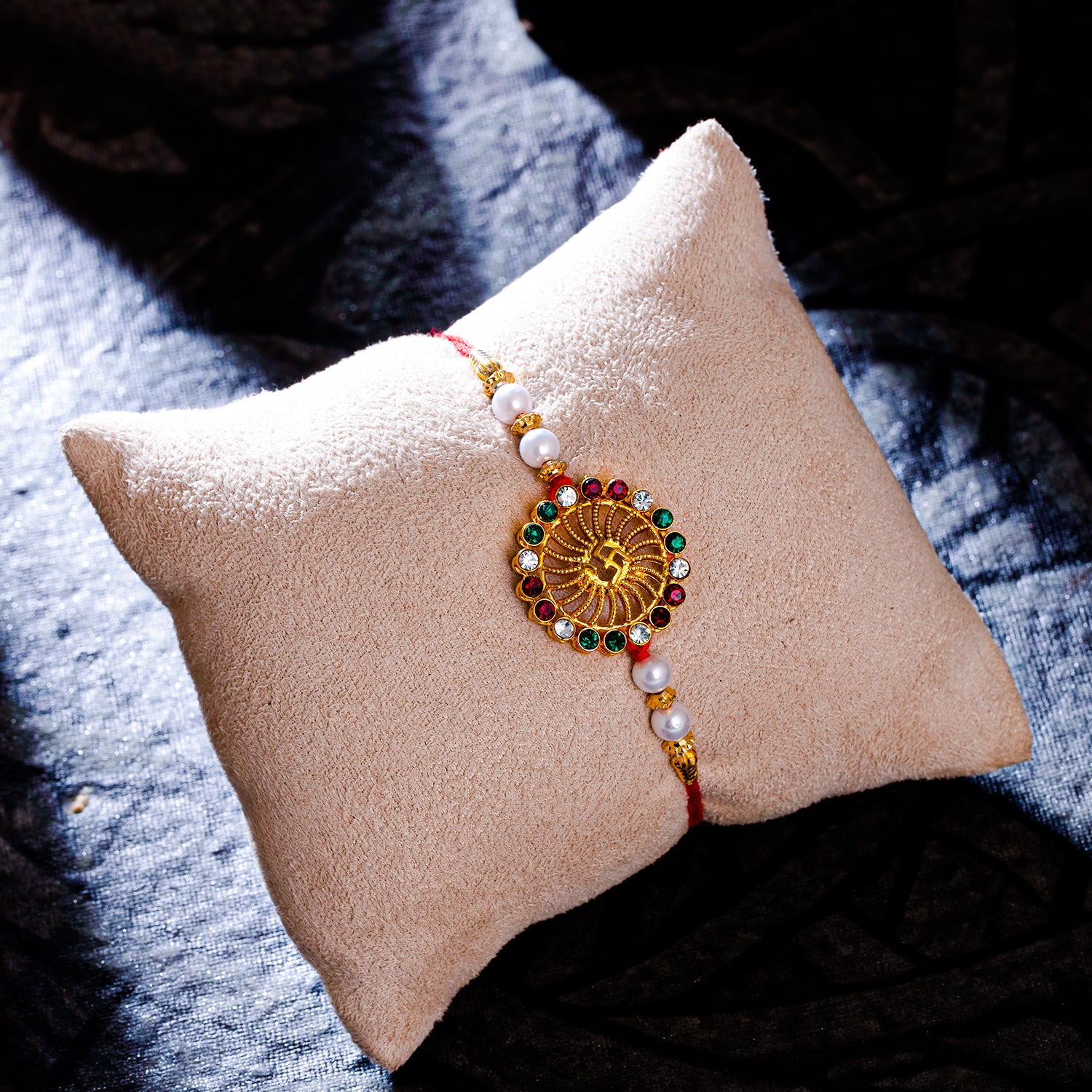 Sukkhi Elegant Gold Plated Swastik Rakhi with Roli Chawal and Raksha Bandhan Greeting Card For Men