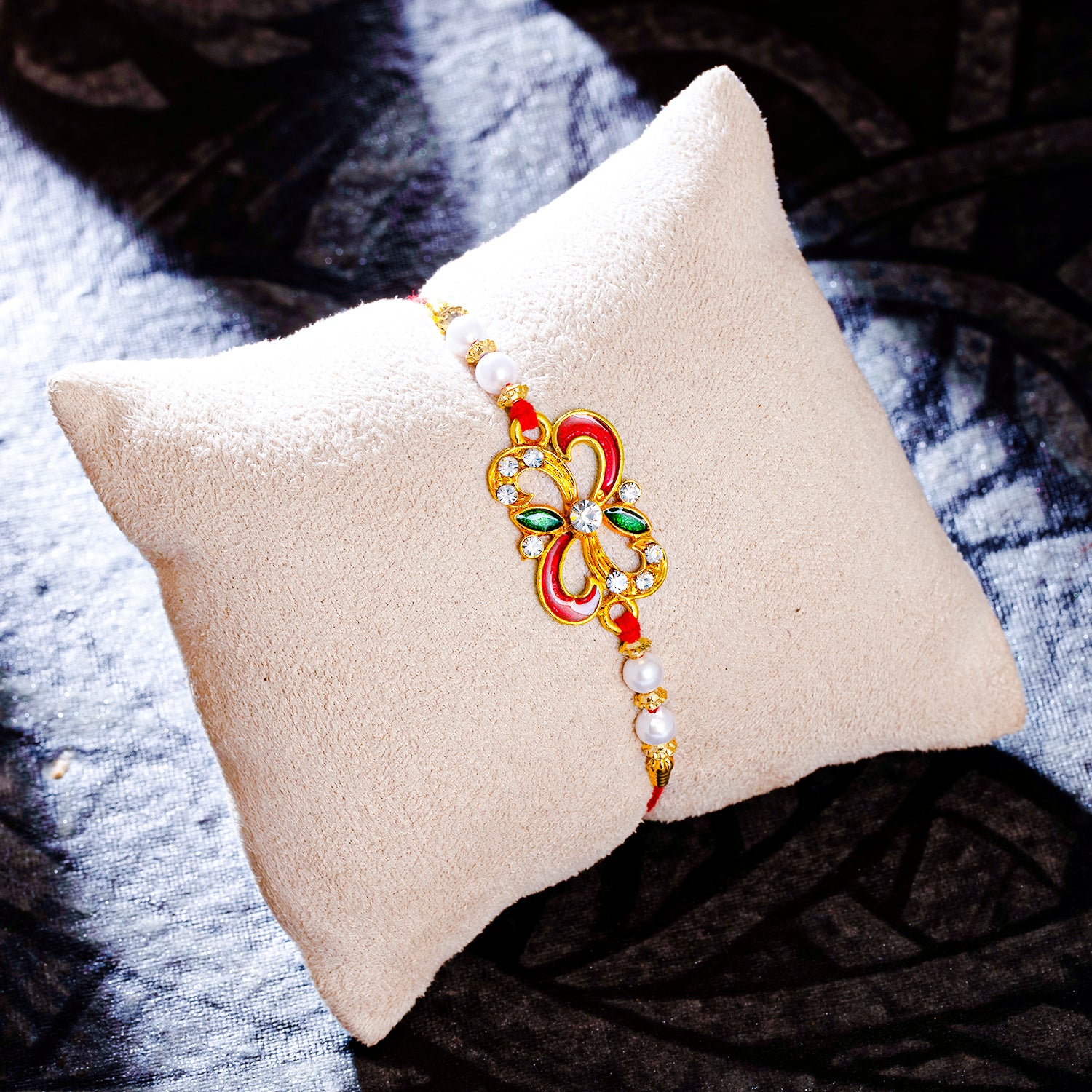 Sukkhi Dazzling Gold Plated Meenakari Rakhi with Roli Chawal and Raksha Bandhan Greeting Card For Men