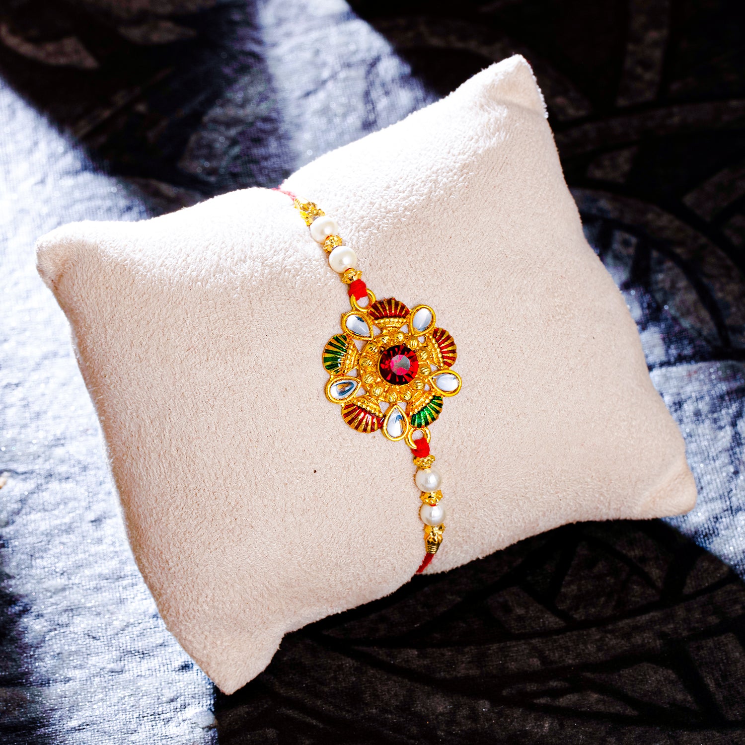 Sukkhi Delicate Gold Plated Kundan Meenakari Rakhi with Roli Chawal and Raksha Bandhan Greeting Card For Men