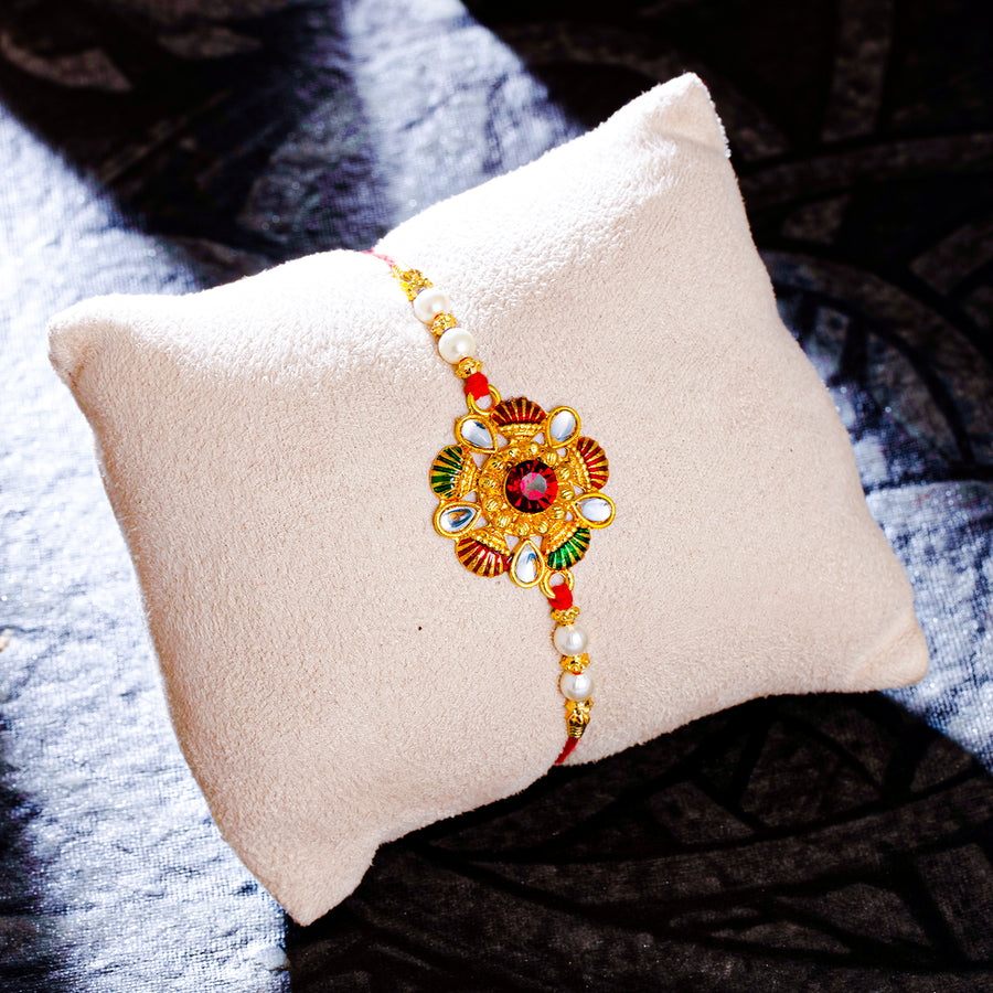 Sukkhi Delicate Gold Plated Kundan Meenakari Rakhi with Roli Chawal and Raksha Bandhan Greeting Card For Men