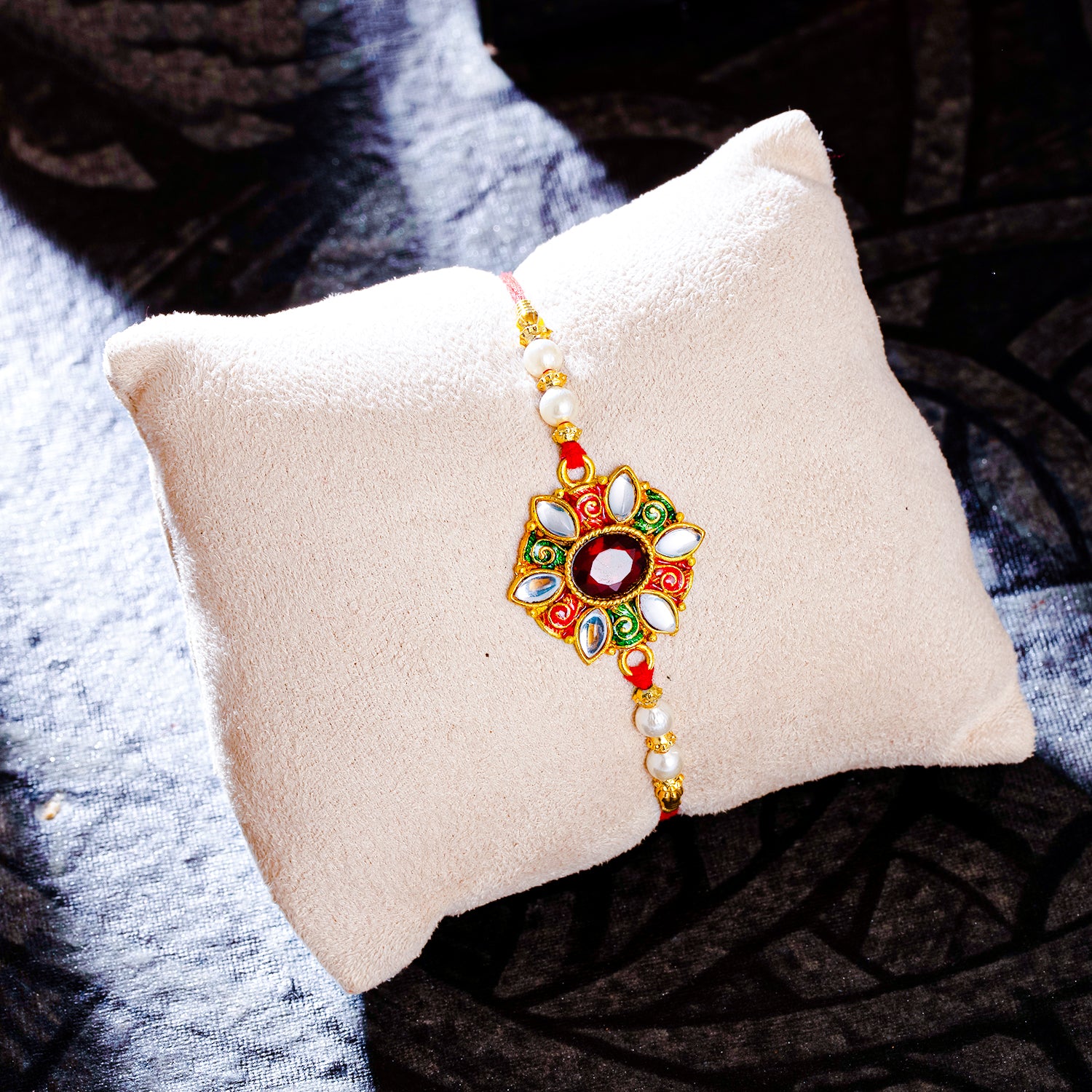 Sukkhi Lovely Gold Plated Kundan Meenakari Rakhi with Roli Chawal and Raksha Bandhan Greeting Card For Men