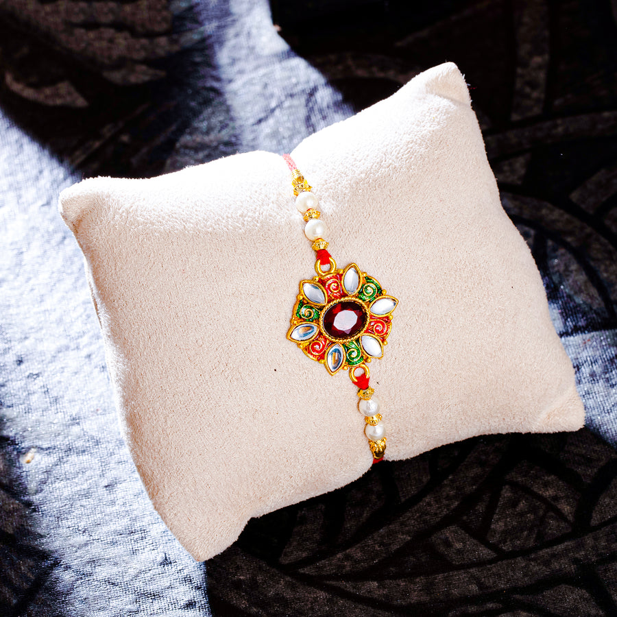 Sukkhi Lovely Gold Plated Kundan Meenakari Rakhi with Roli Chawal and Raksha Bandhan Greeting Card For Men