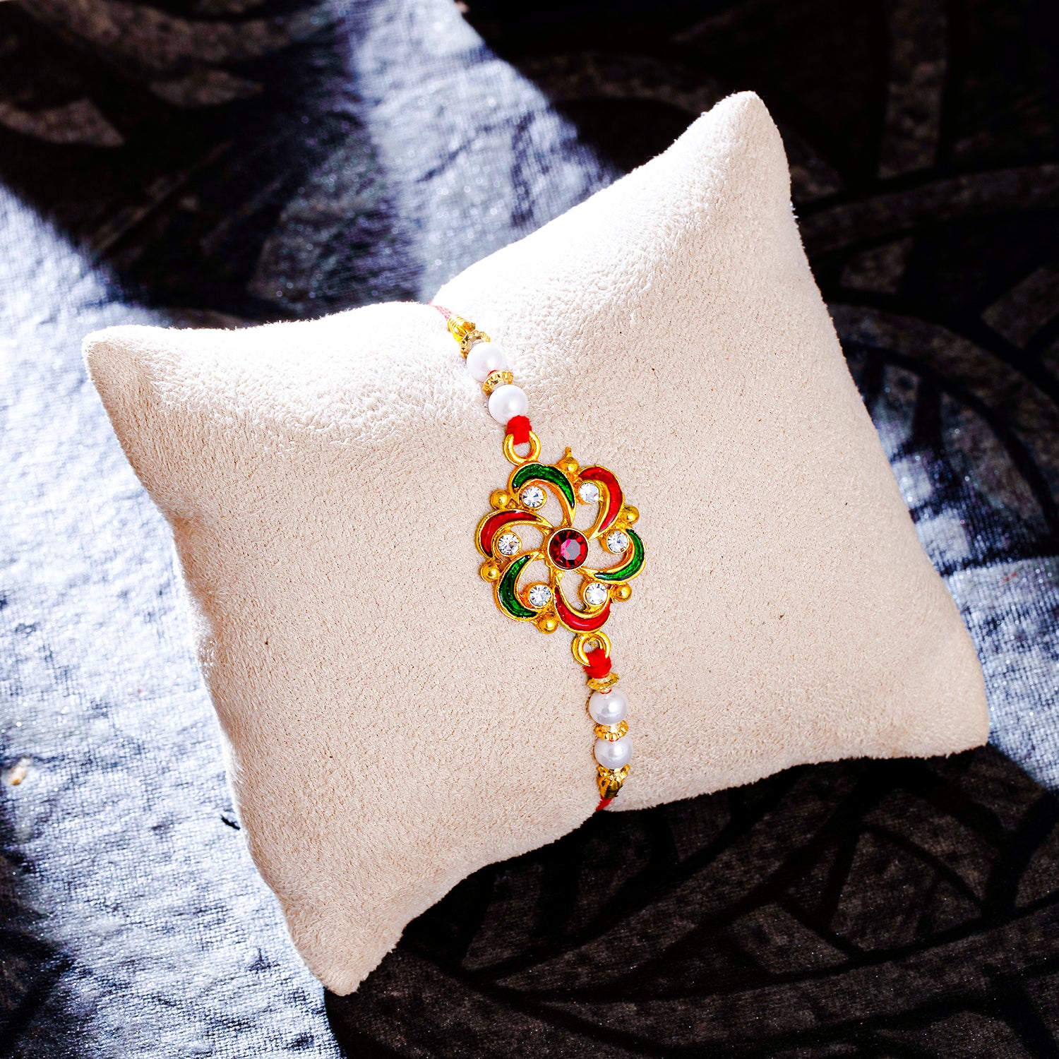 Sukkhi Glossy Gold Plated Floral Meenakari Rakhi with Roli Chawal and Raksha Bandhan Greeting Card For Men