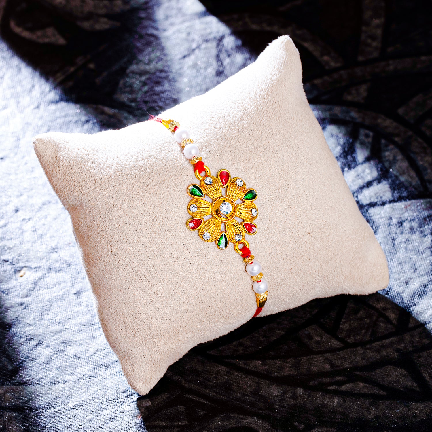 Sukkhi Fancy Gold Plated Floral Rakhi with Roli Chawal and Raksha Bandhan Greeting Card For Men