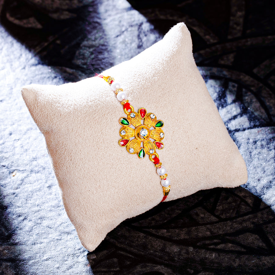 Sukkhi Fancy Gold Plated Floral Rakhi with Roli Chawal and Raksha Bandhan Greeting Card For Men