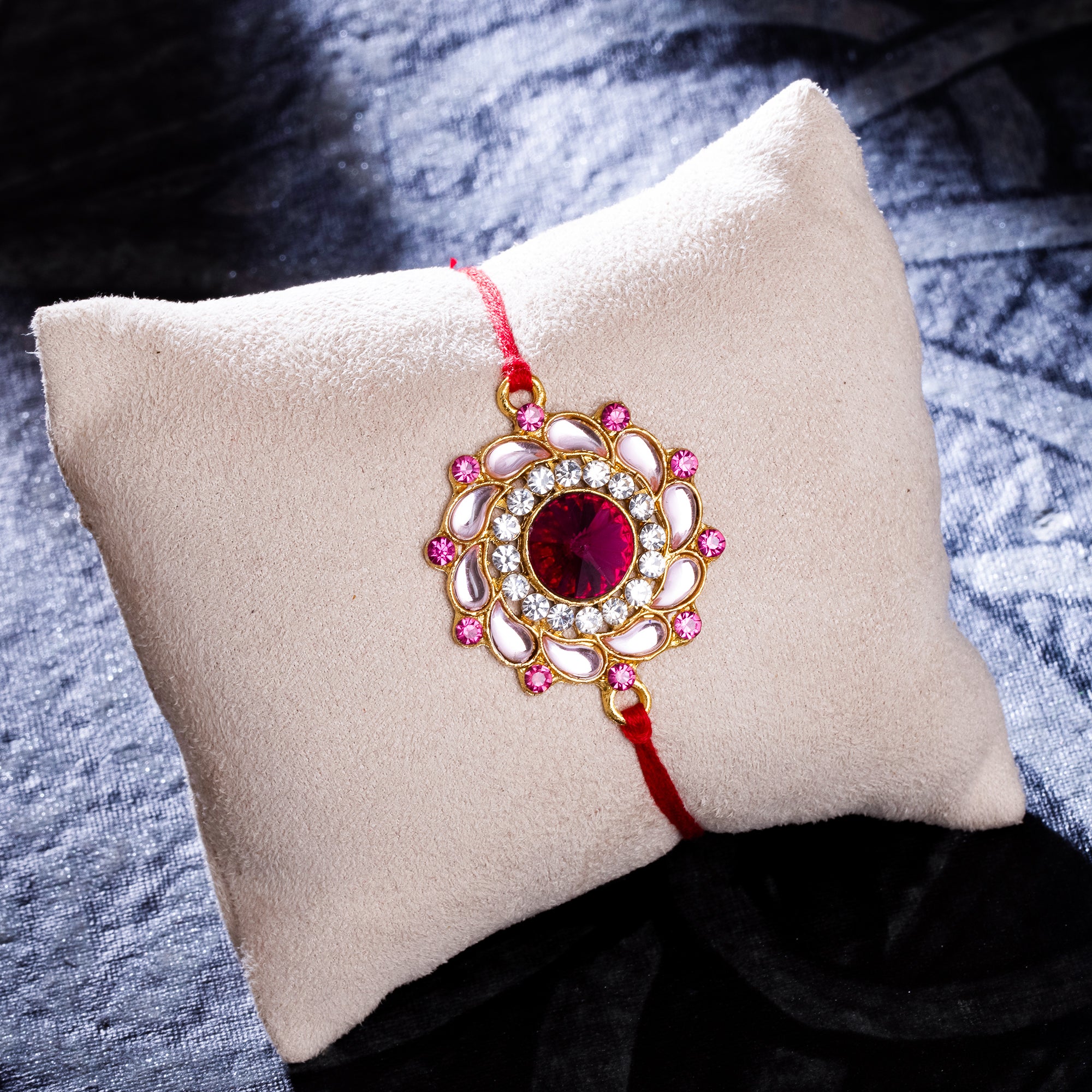 Sukkhi Delightful Gold Plated Floral Kundan Rakhi with Roli Chawal and Raksha Bandhan Greeting Card For Men