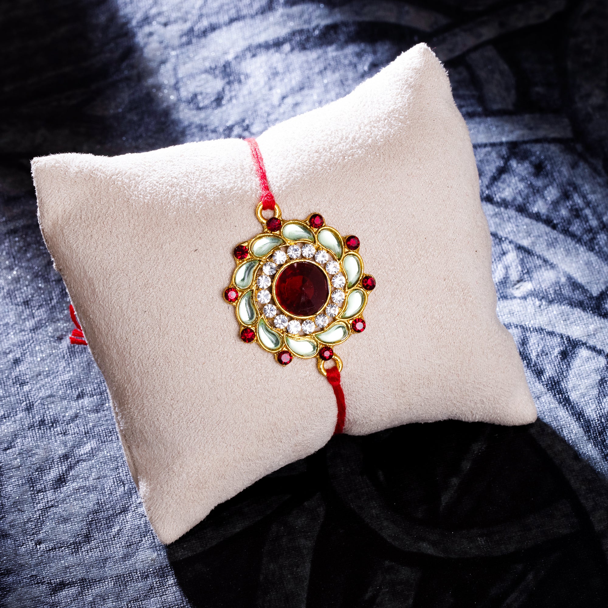 Sukkhi Fabulous Gold Plated Floral Kundan Rakhi with Roli Chawal and Raksha Bandhan Greeting Card For Men