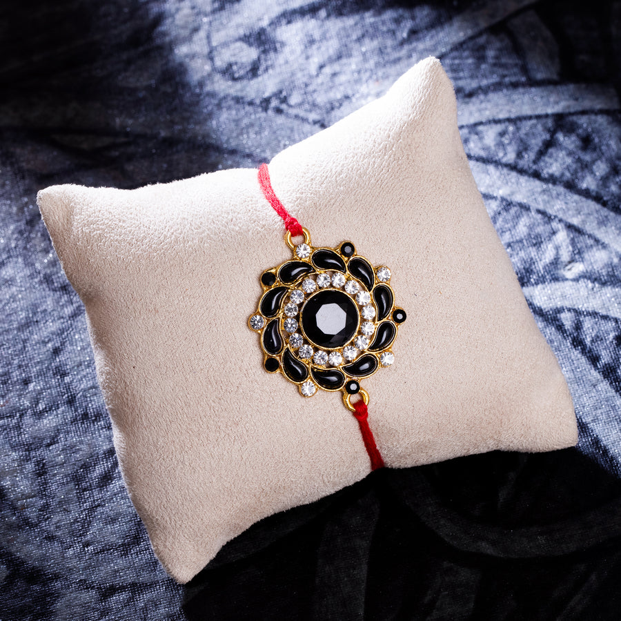 Sukkhi Elegant Gold Plated Floral Rakhi with Roli Chawal and Raksha Bandhan Greeting Card For Men