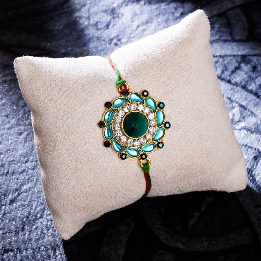 Sukkhi Attractive Gold Plated Floral Rakhi with Roli Chawal and Raksha Bandhan Greeting Card For Men