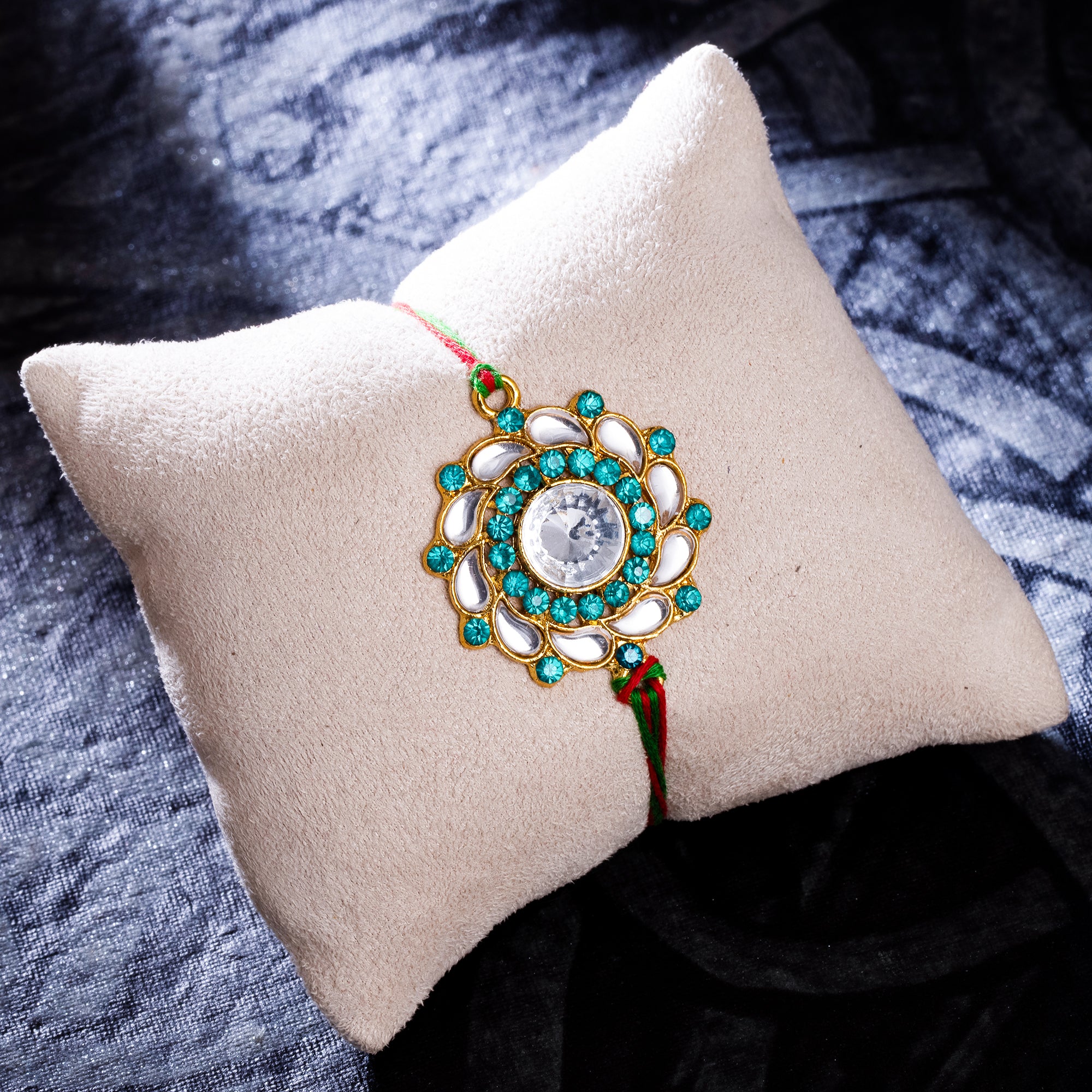 Sukkhi Brilliant Gold Plated Floral Kundan Rakhi with Roli Chawal and Raksha Bandhan Greeting Card For Men