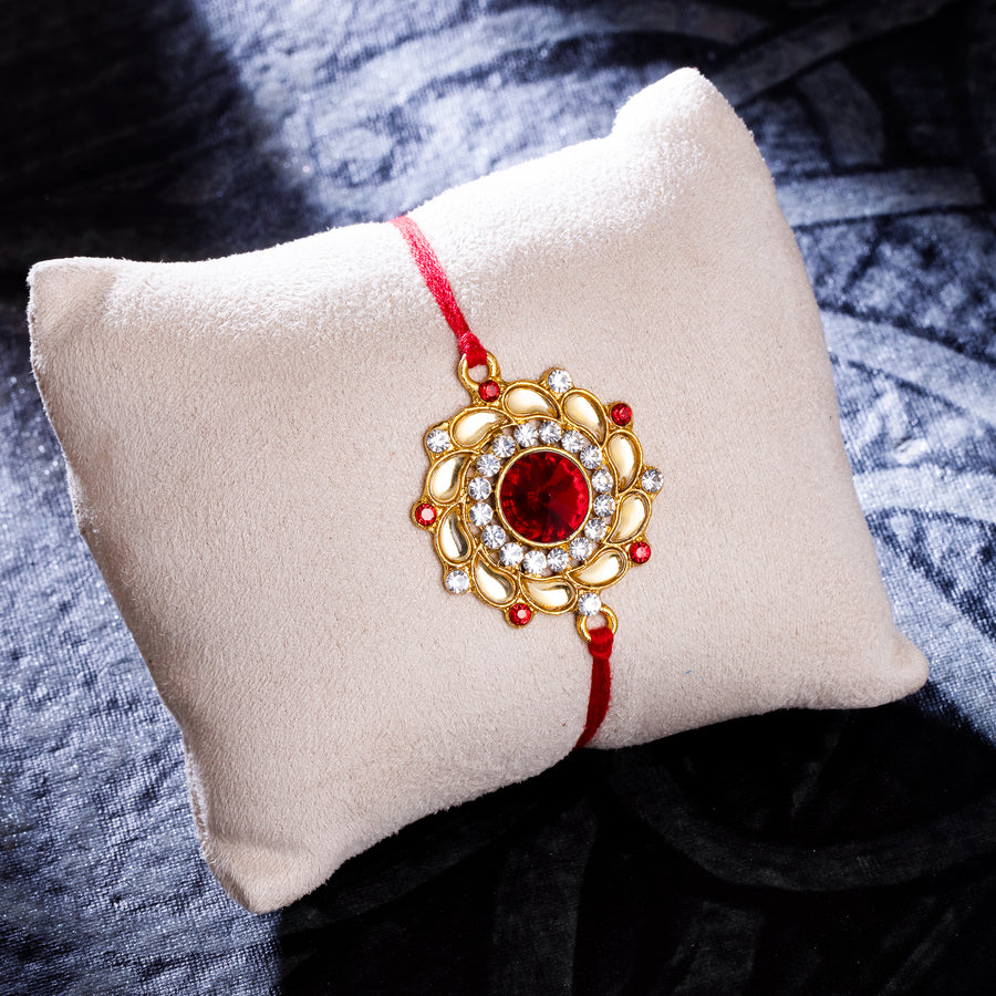 Sukkhi Amazing Gold Plated Floral Rakhi with Roli Chawal and Raksha Bandhan Greeting Card For Men