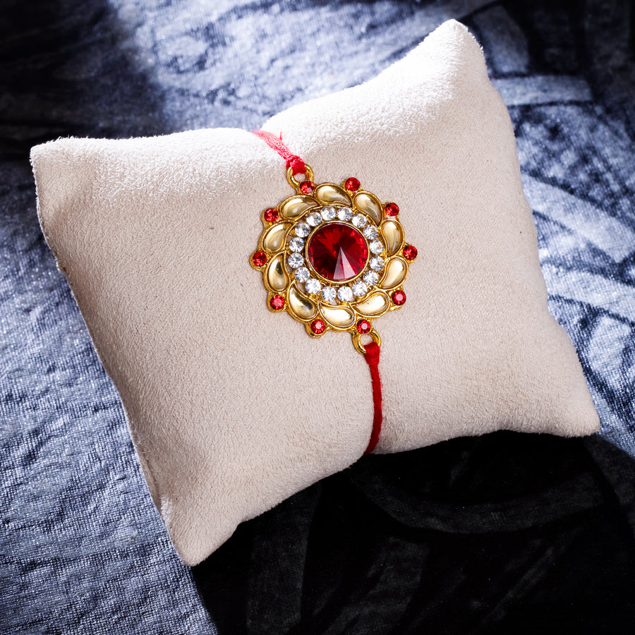 Sukkhi Glossy Gold Plated Floral Rakhi with Roli Chawal and Raksha Bandhan Greeting Card For Men