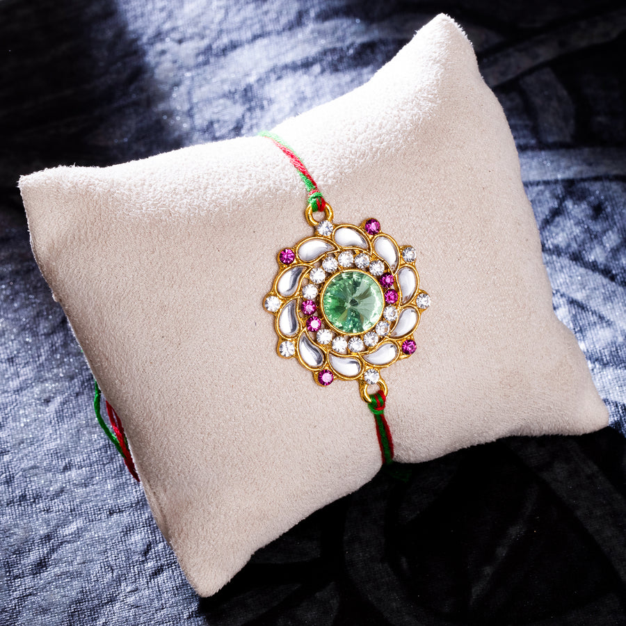 Sukkhi Glimmery Gold Plated Floral Kundan Rakhi with Roli Chawal and Raksha Bandhan Greeting Card For Men