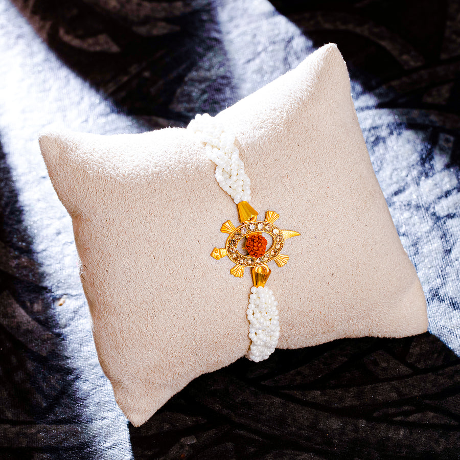 Sukkhi Ethnic Gold Plated Turtle Rudraksha Rakhi with Roli Chawal and Raksha Bandhan Greeting Card For Men