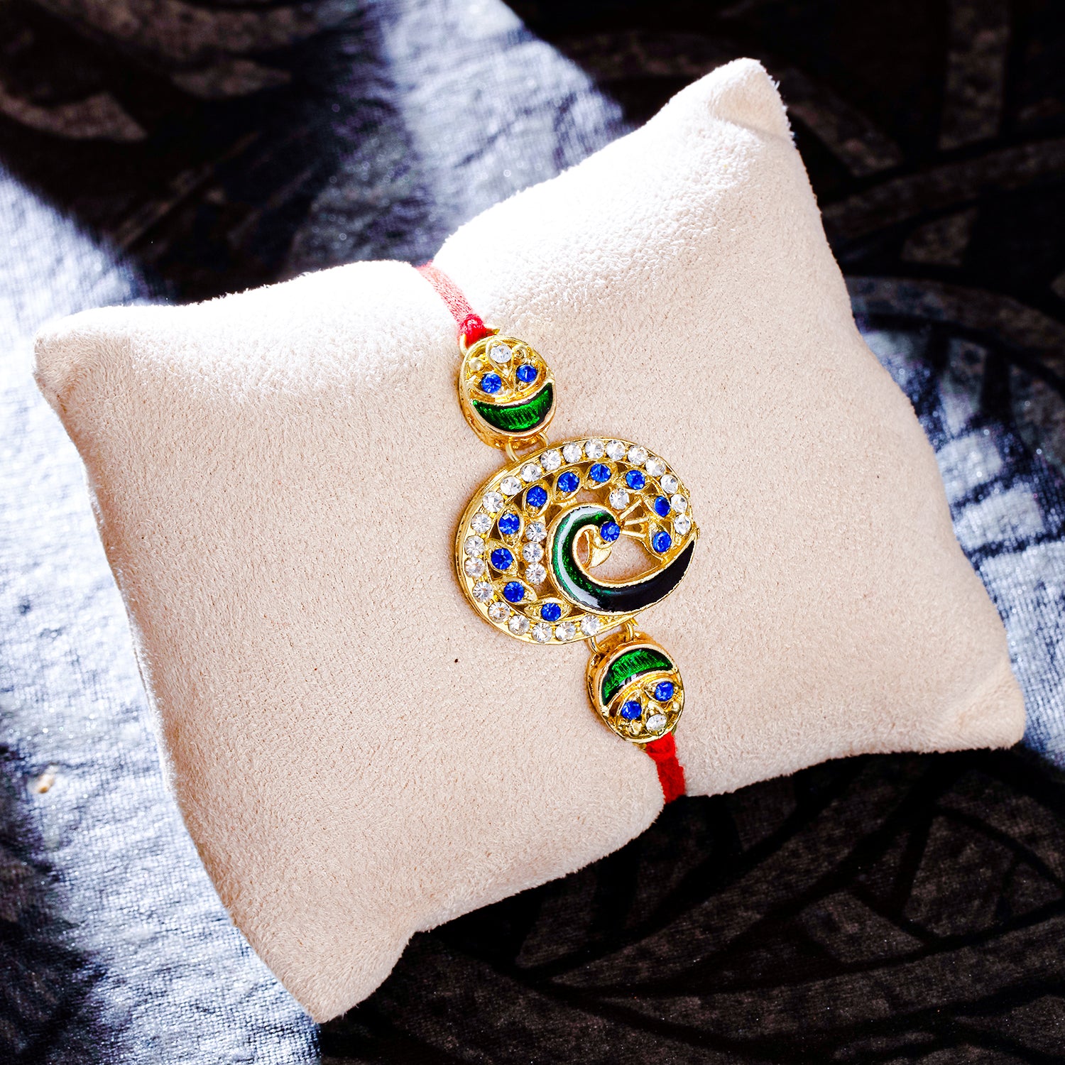 Sukkhi Lovley Gold Plated Peacock Meenakari Rakhi with Roli Chawal and Raksha Bandhan Greeting Card For Men