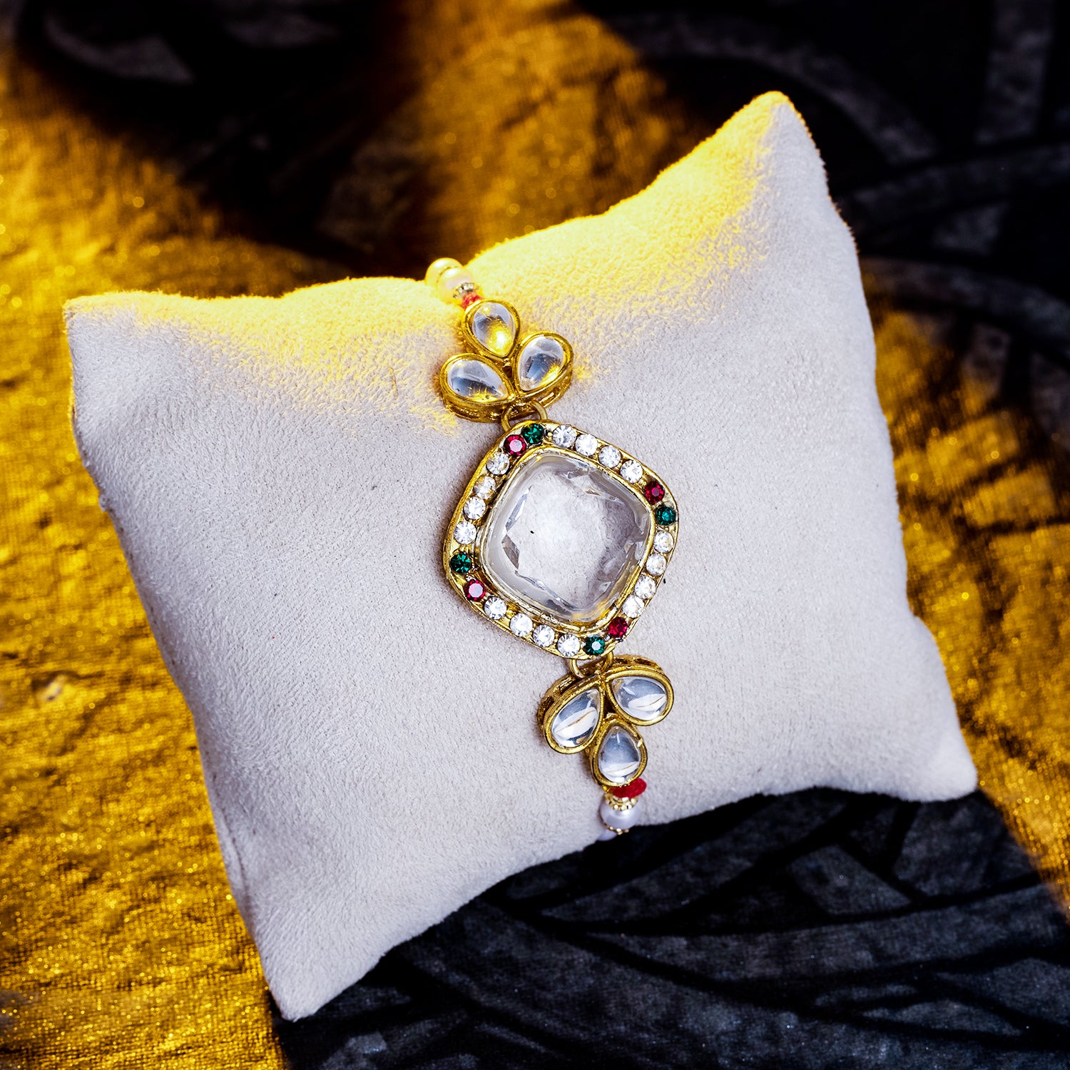 Sukkhi Delightful Gold Plated Kundan Rakhi with Roli Chawal and Raksha Bandhan Greeting Card For Men