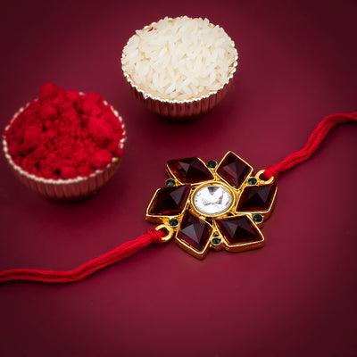 Sukkhi Cluster Gold Plated Red Floral Rakhi with Roli Chawal and Raksha Bandhan Greeting Card For Men
