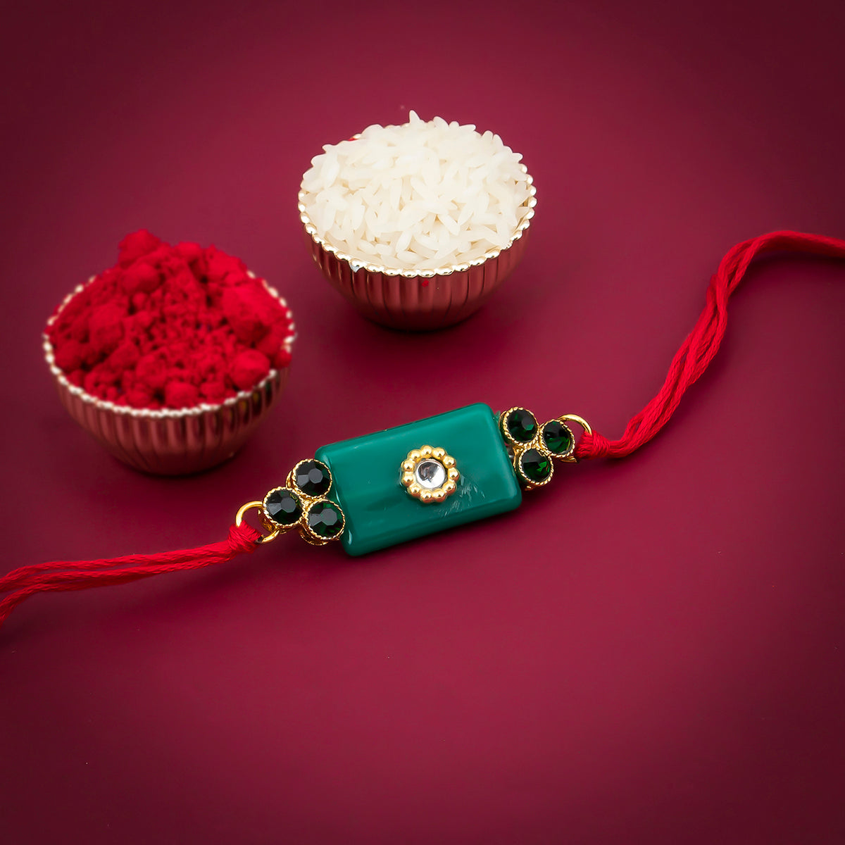 Sukkhi Pleasing Gold Plated Solid Rakhi with Roli Chawal and Raksha Bandhan Greeting Card For Men