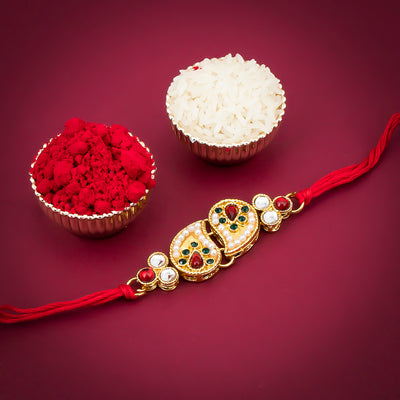 Sukkhi Exotic Twisted Pear Gold Plated rakhi for brother with Roli Chawal and Raksha Bandhan Greeting Card For Men