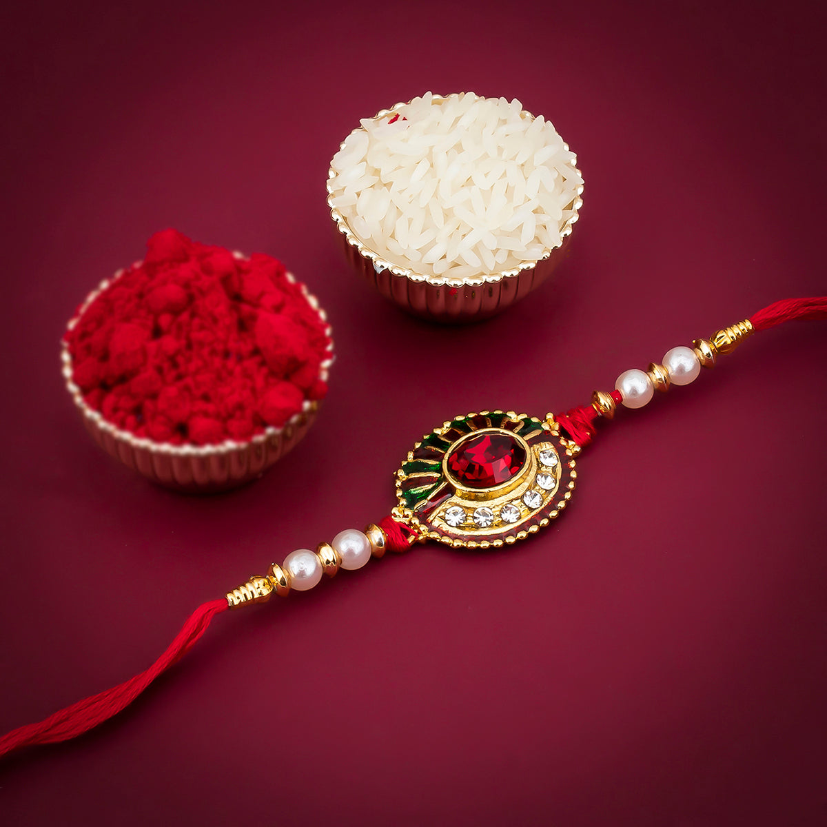Sukkhi Dazzling Gold Plated Round Meenakari Rakhi with Roli Chawal and Raksha Bandhan Greeting Card For Men