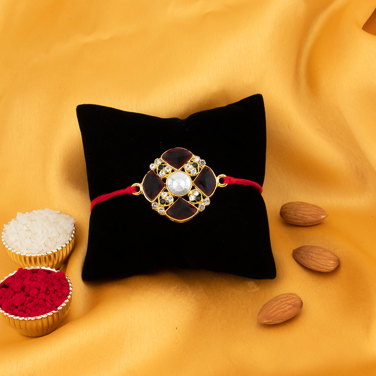 Sukkhi Classic Gold Plated Round Red Rakhi with Roli Chawal and Raksha Bandhan Greeting Card For Men