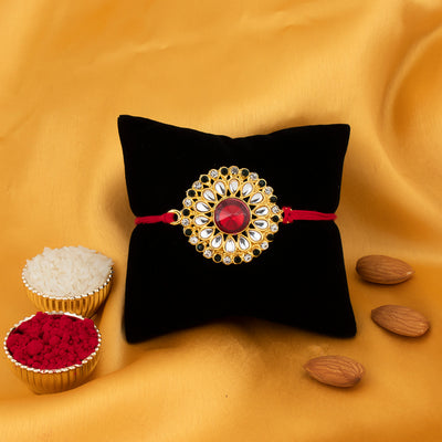 Sukkhi Blossomy Designer Floral Gold Plated rakhi with Roli Chawal and Raksha Bandhan Greeting Card For Men