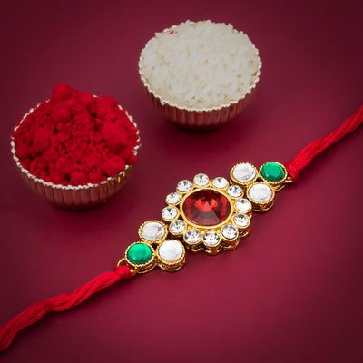 Sukkhi Exquisite Gold Plated Floral Rakhi with Roli Chawal and Raksha Bandhan Greeting Card For Men