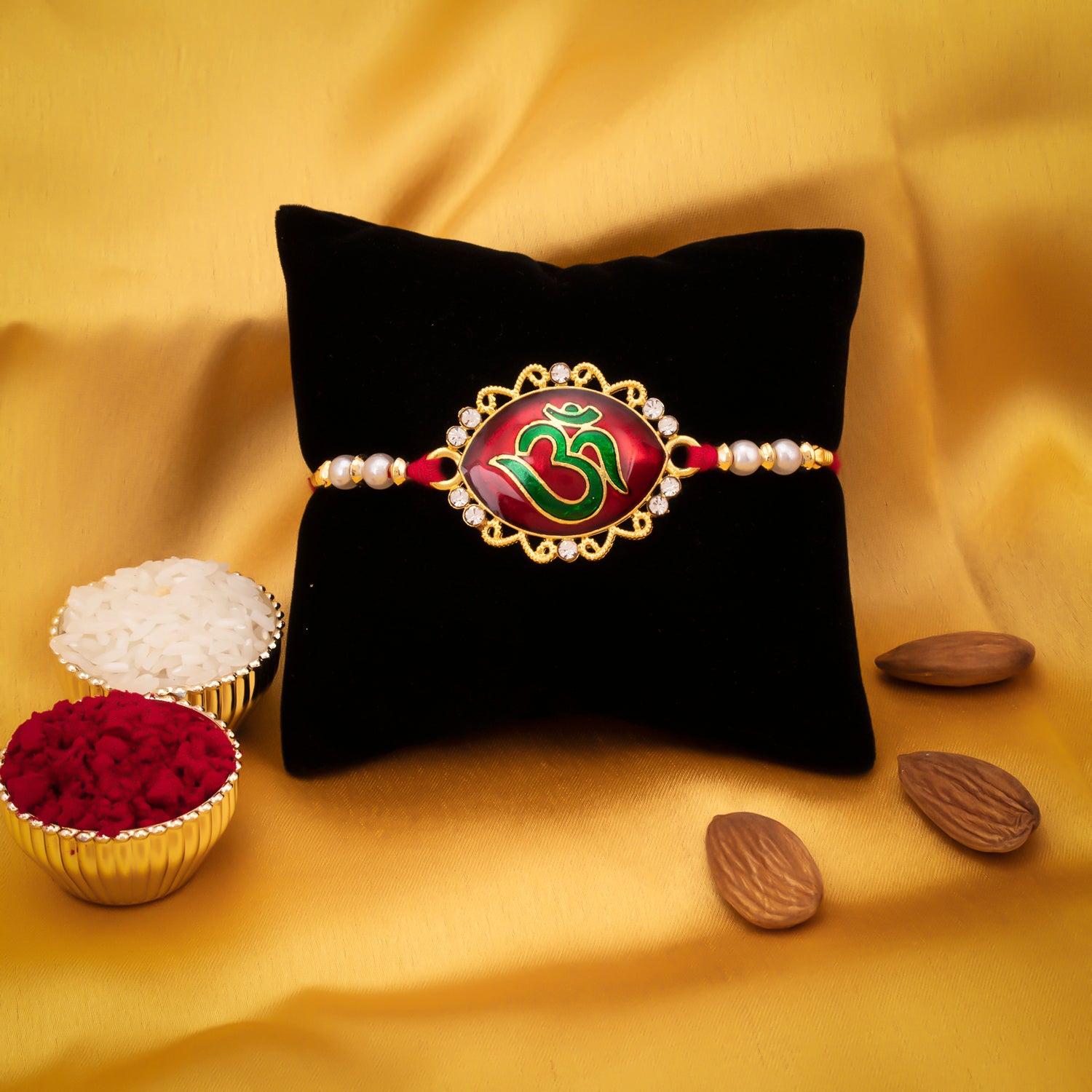 Sukkhi Resplendent Gold Plated Meenakari OM Designed Rakhi with Roli Chawal and Raksha Bandhan Greeting Card For Men