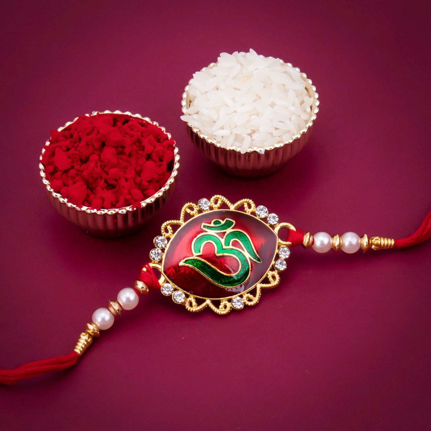 Sukkhi Resplendent Gold Plated Meenakari OM Designed Rakhi with Roli Chawal and Raksha Bandhan Greeting Card For Men