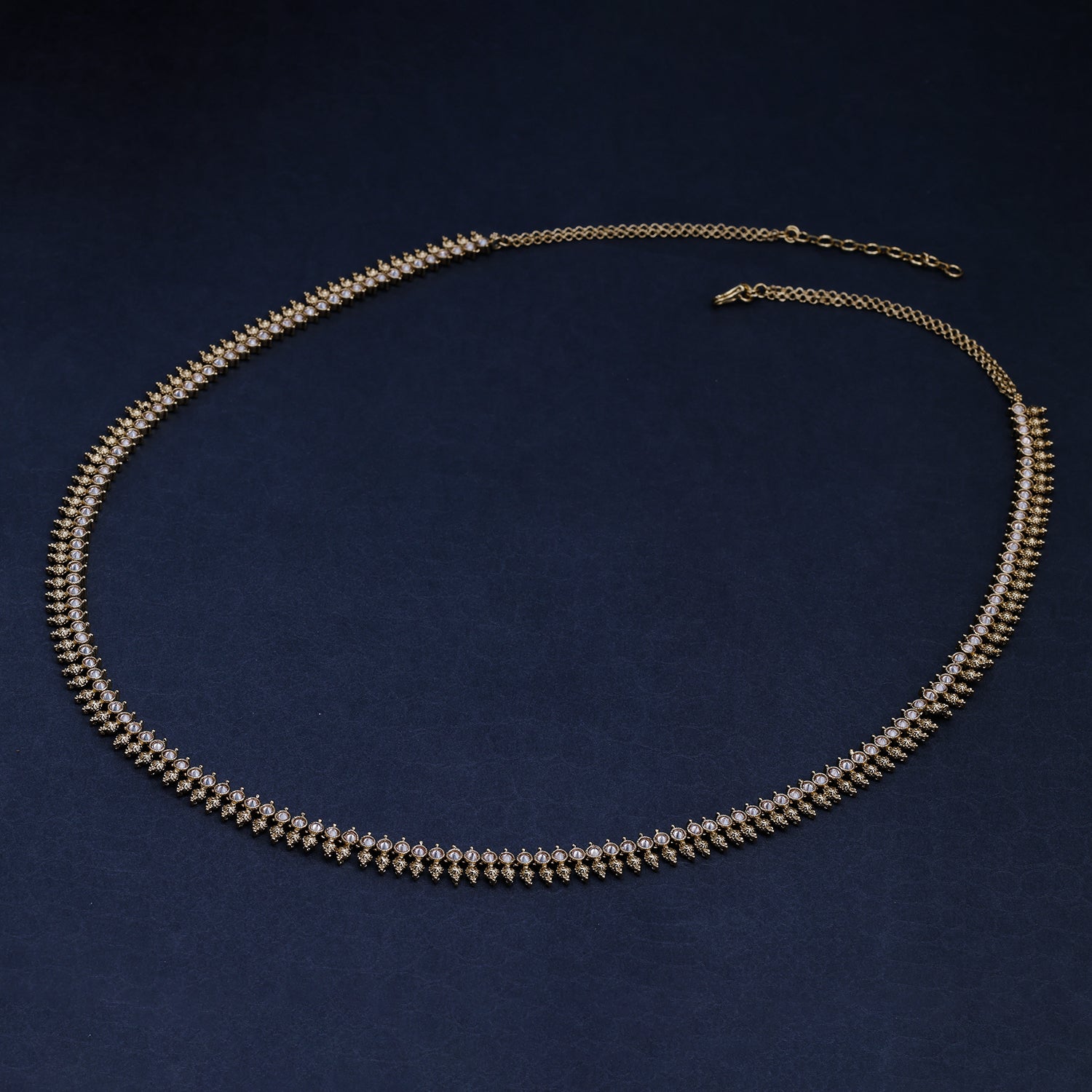 Sukkhi Golden Gold Plated Reverse AD & Pearl KamarBand For Women