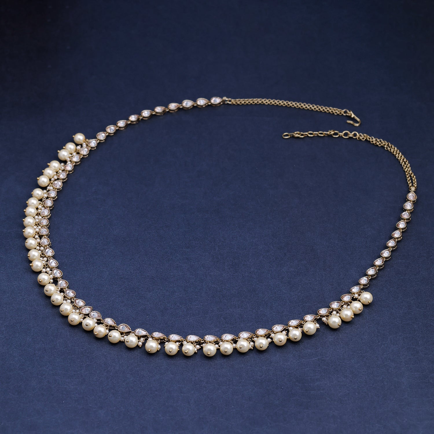 Sukkhi Golden Gold Plated Reverse AD & Pearl KamarBand For Women