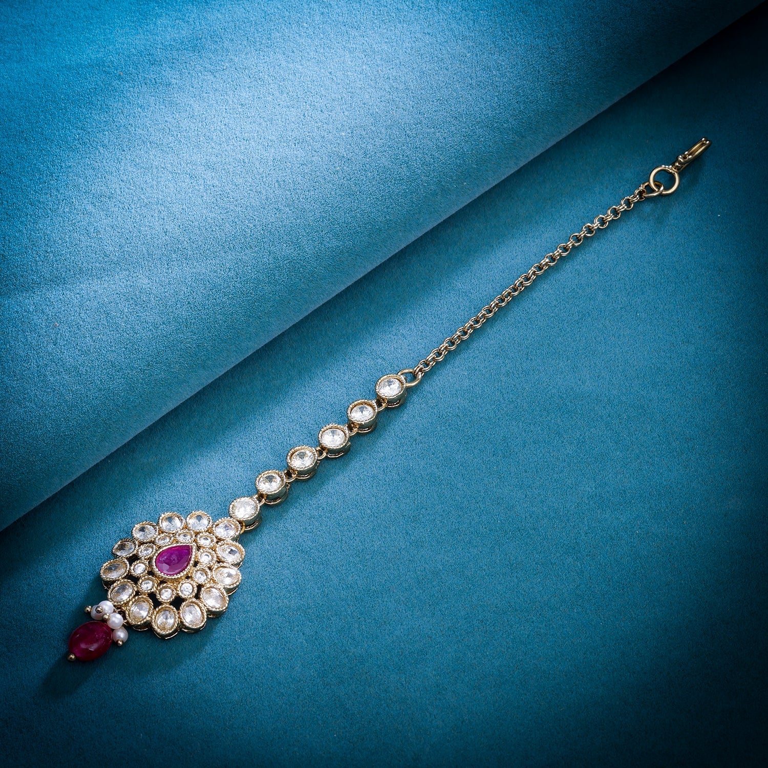 Sukkhi Golden Gold Plated Reverse AD & Pearl Maangtikka For Women