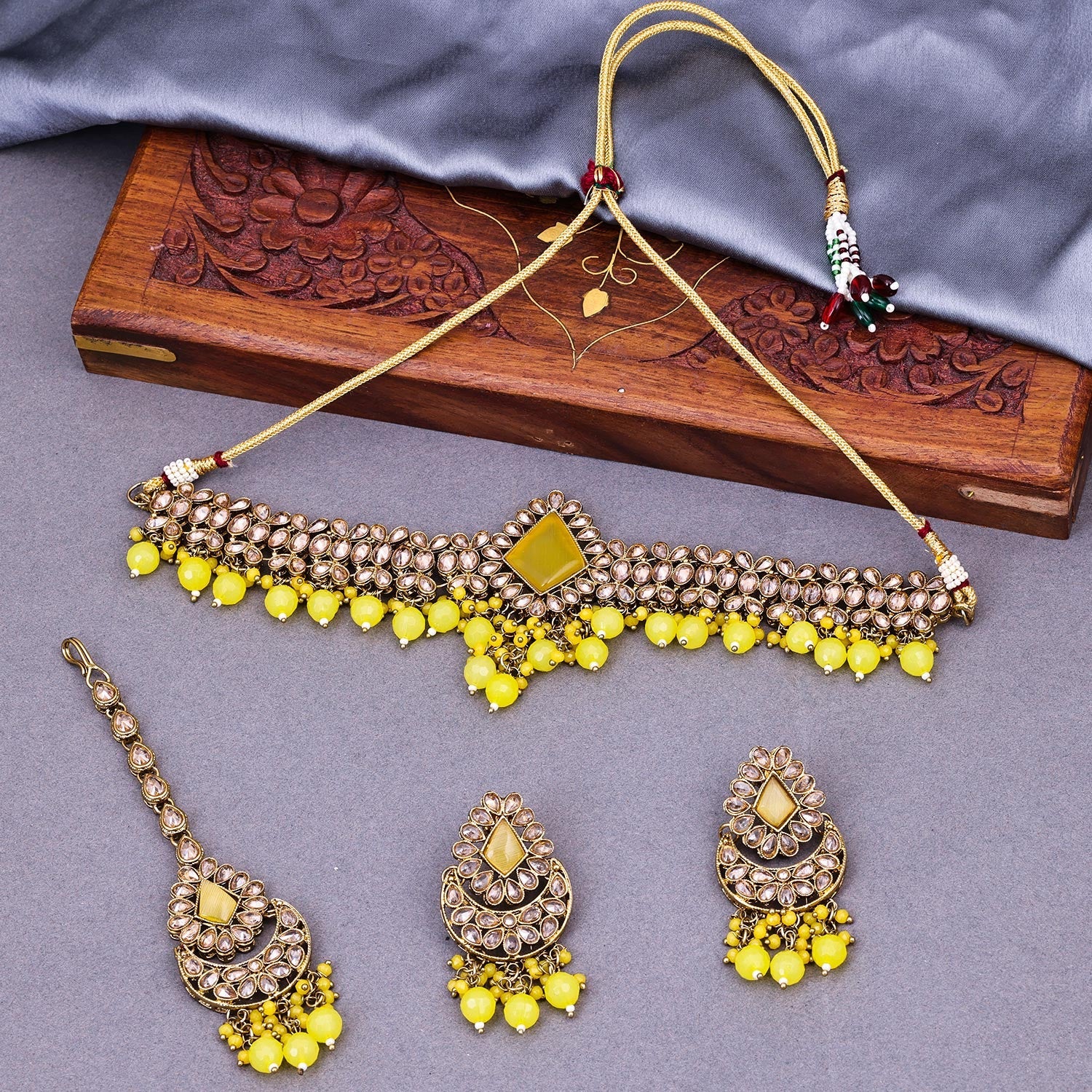 Sukkhi Yellow Gold Plated Reverse AD & Pearl Choker Necklace Set For Women