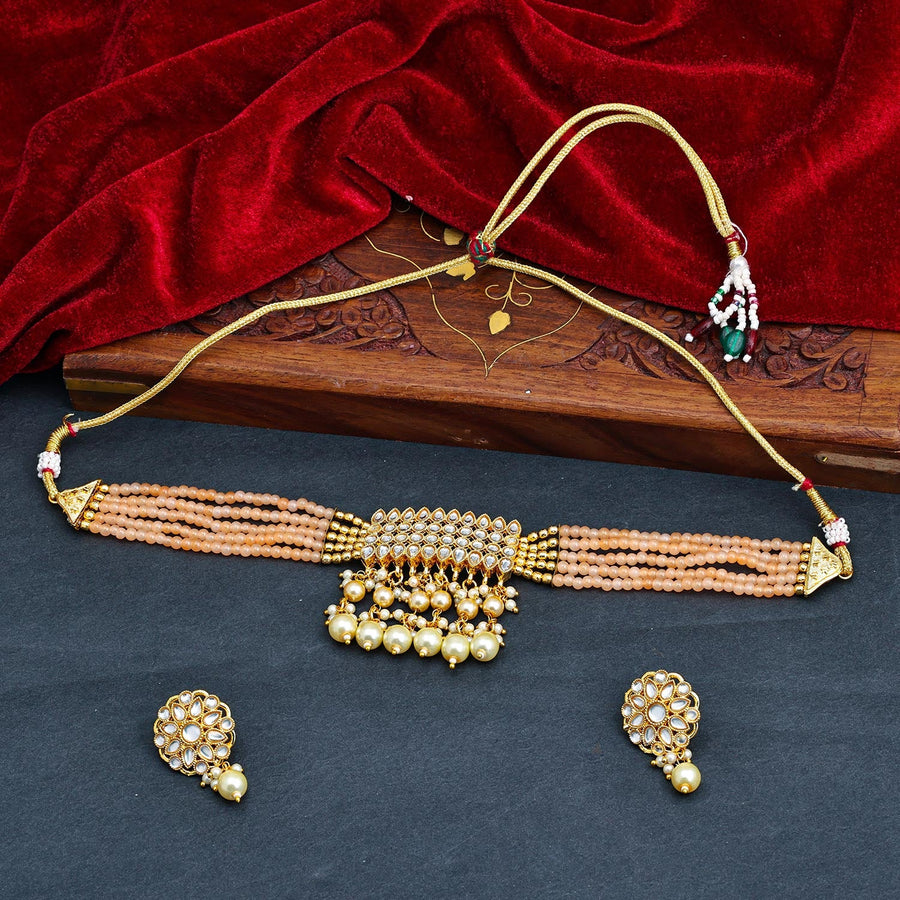Sukkhi Peach Gold Plated Kundan & Pearl Choker Necklace Set For Women
